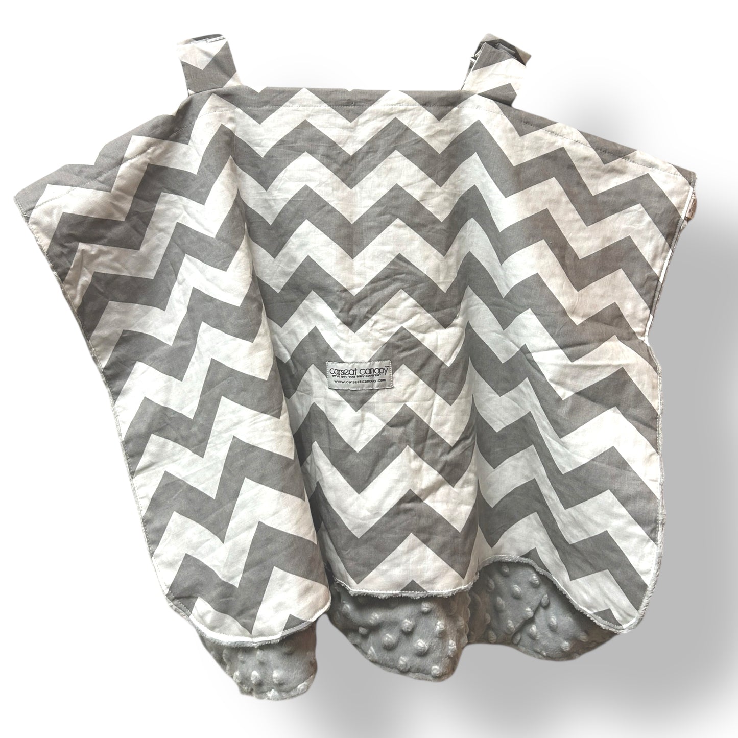 Gray and white chevron-patterned baby blanket with textured surface on a white background