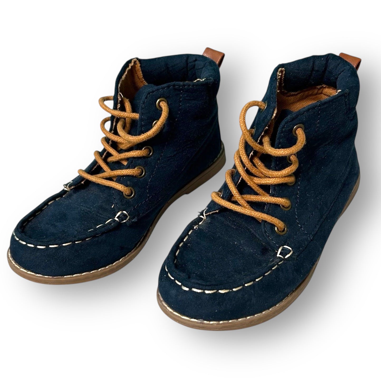 Pair of navy blue boots with brown laces on a white background