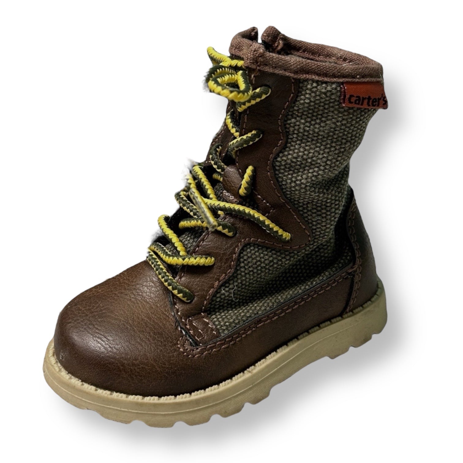 Brown children's boot with yellow laces on a white background