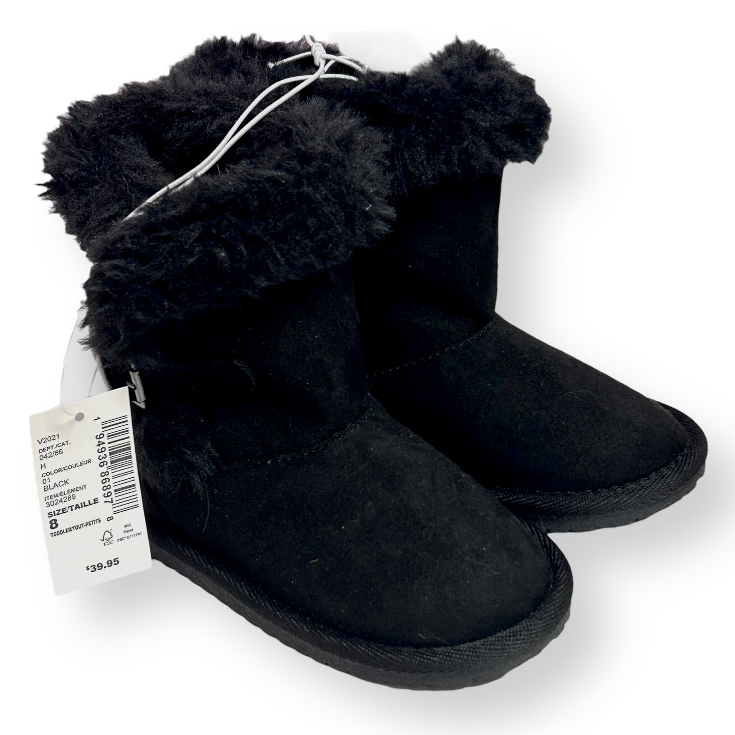 Black furry boots with a tag on a white background