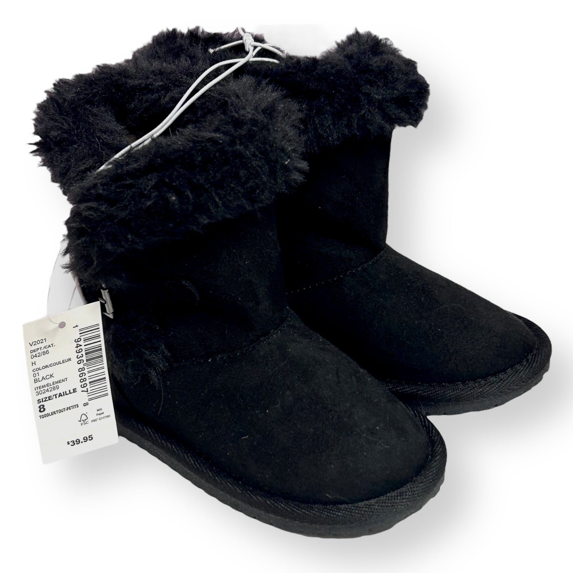 Black furry boots with a tag on a white background