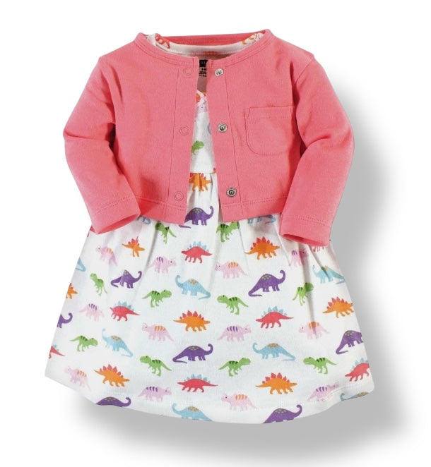 Pink jacket over a colorful dinosaur-patterned dress on a white background