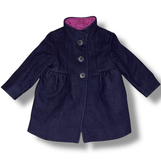 Navy blue coat with a pink interior lining on a white background