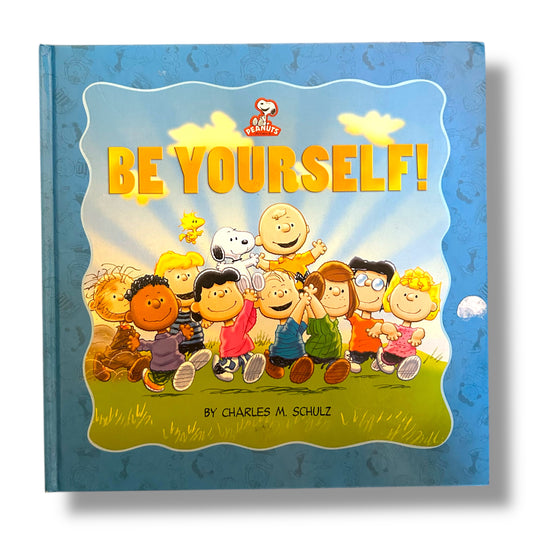 Book cover of 'Be Yourself!' by Charles M. Schulz featuring cartoon characters on a blue background.