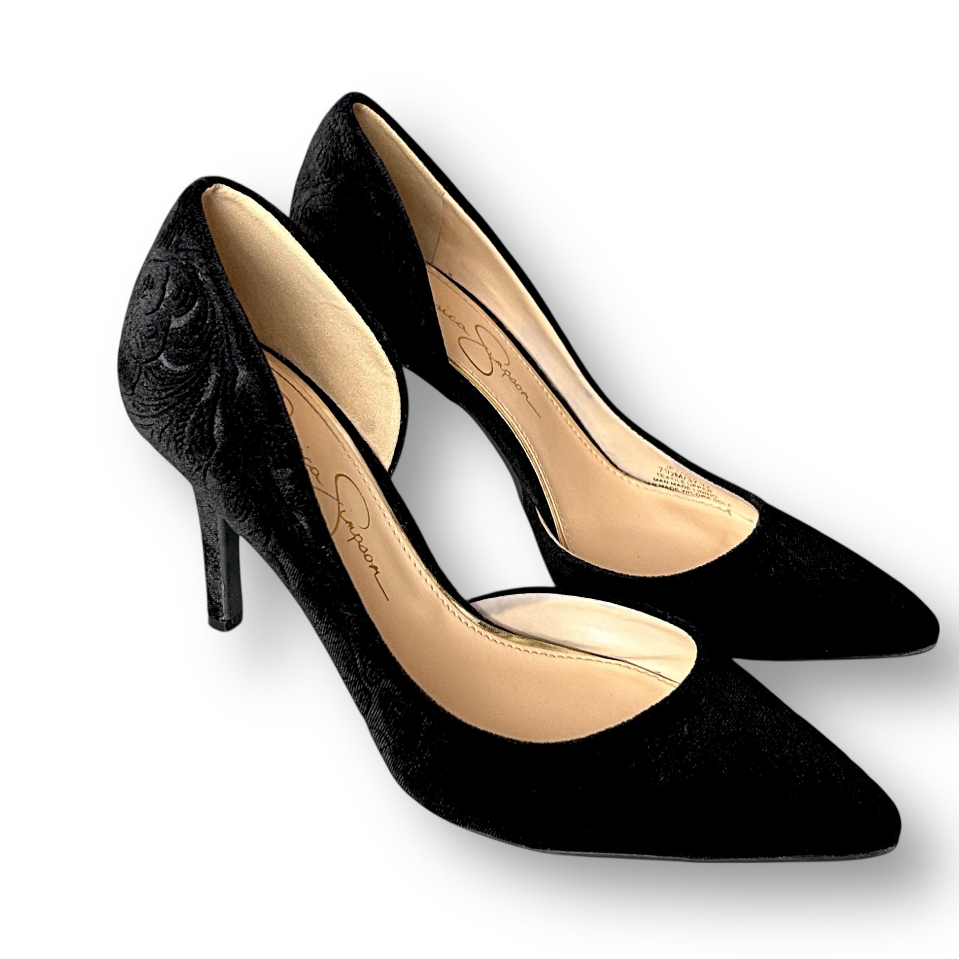 Black high-heeled shoes on a white background
