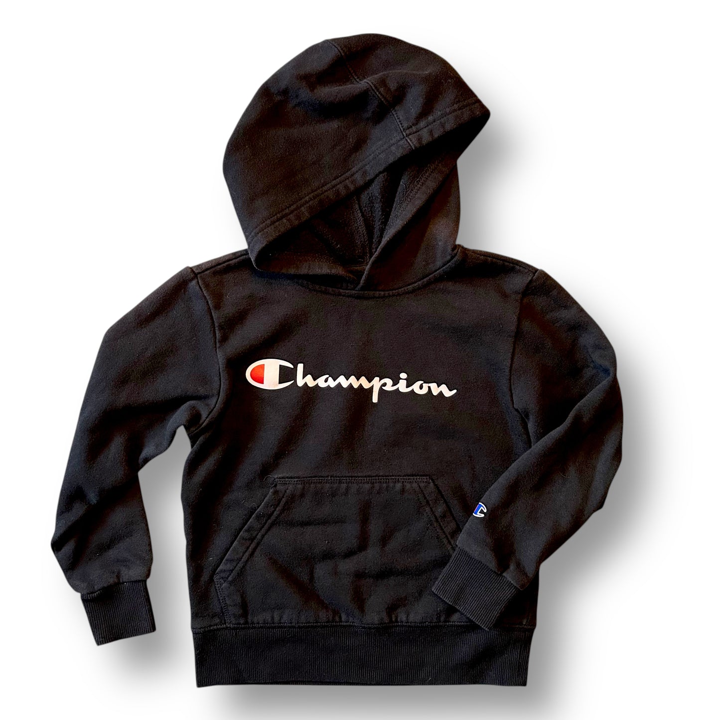 Black hoodie with Champion logo on a white background
