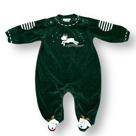 Green baby onesie with reindeer design on a white background