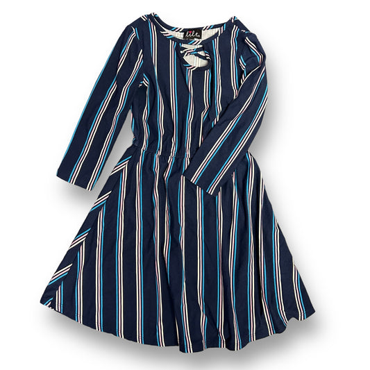A dark blue striped long sleeve twirl dress for girls, displayed on a hanger.