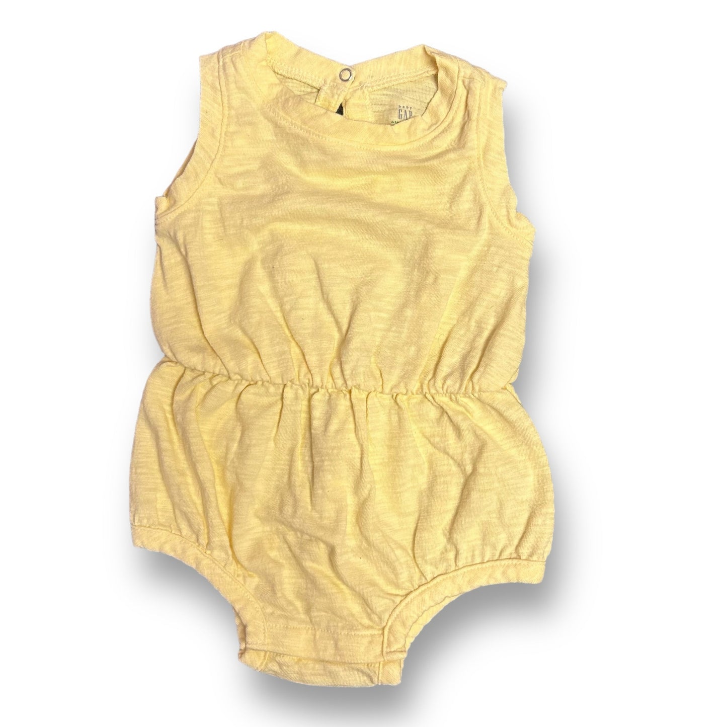 A pale yellow snap bottom romper for girls, displayed on a plain background.